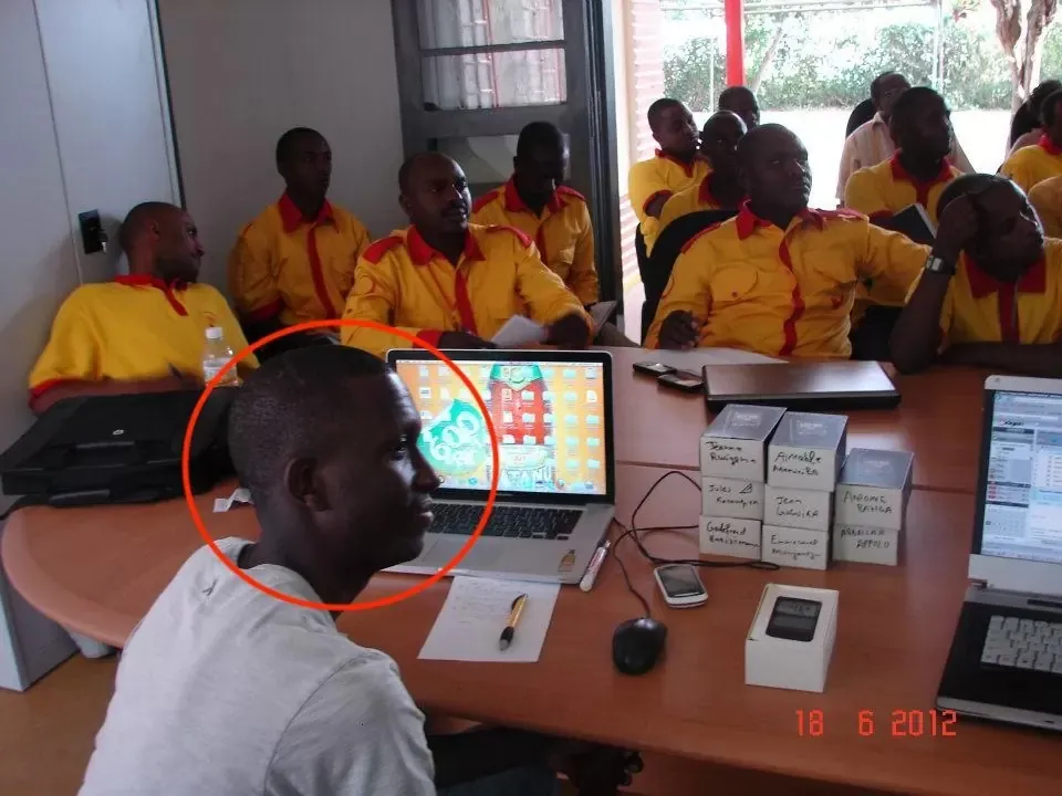 Claude Buzizi at his desk inside the factory in 2012